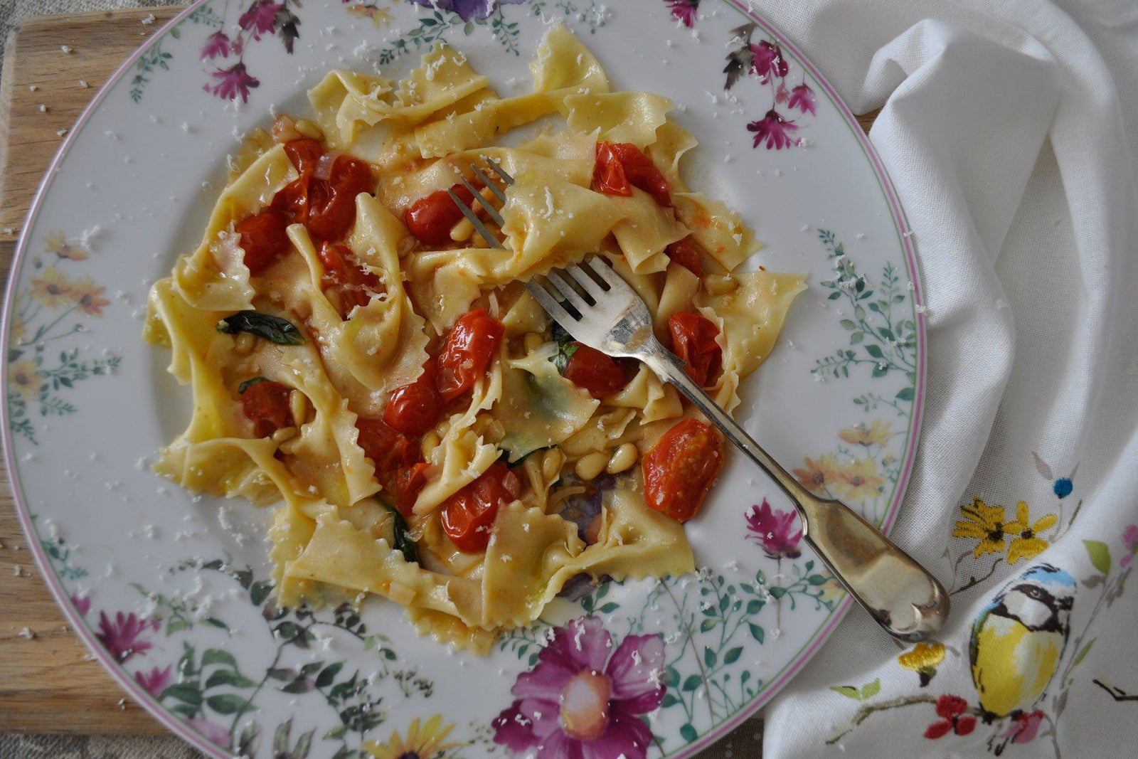 Fava Farfalle with Pinenuts and Tomato
